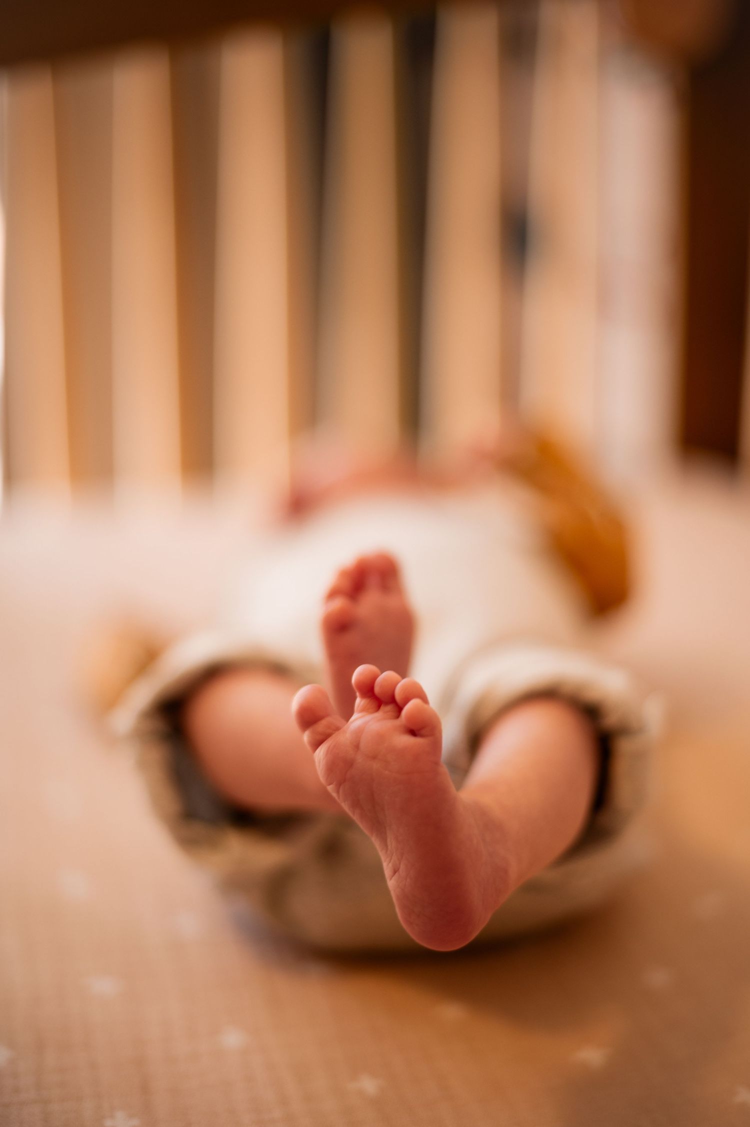 A cozy in-home newborn session in Denver, capturing the tender moments between parents and their precious little one. Soft, natural light