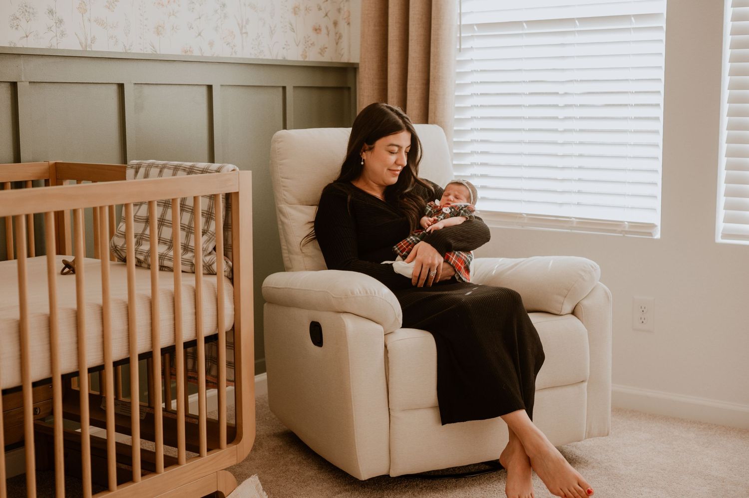 A cozy in-home newborn session in Denver, capturing the tender moments between parents and their precious little one. Soft, natural light fi