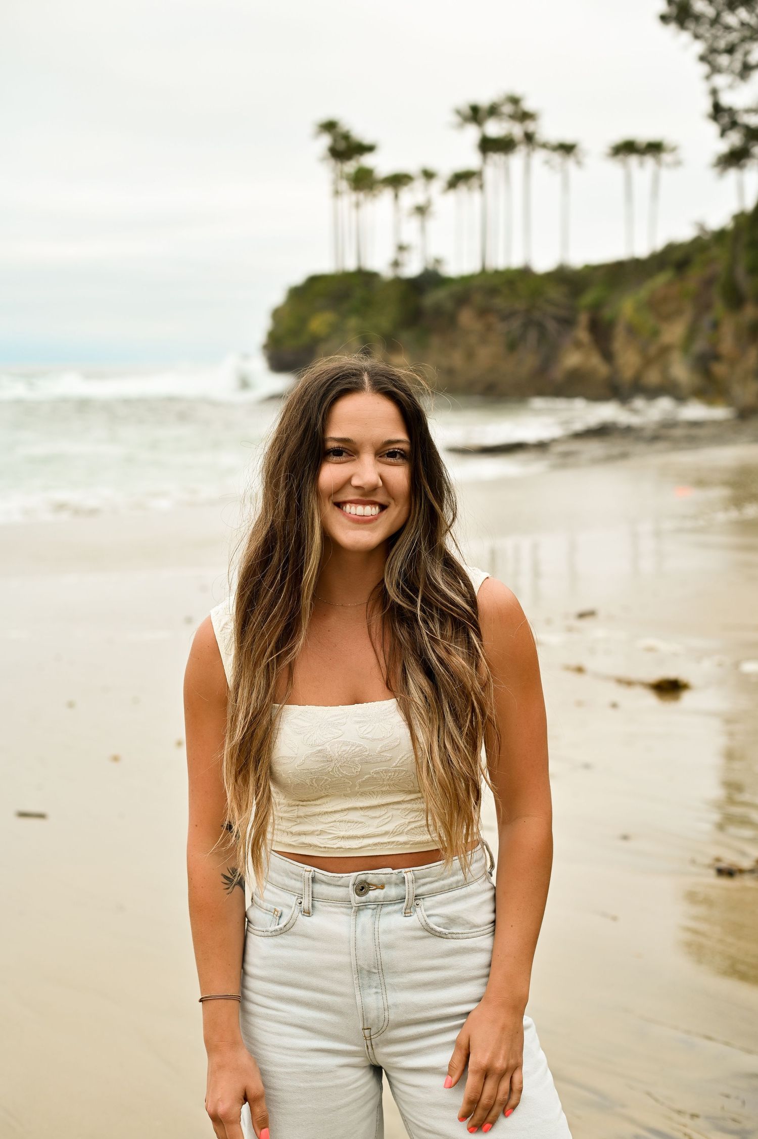 Effortlessly stylish, a branding shot of a girl in sunny California, capturing her unique personality and vibrant energy against a beautiful