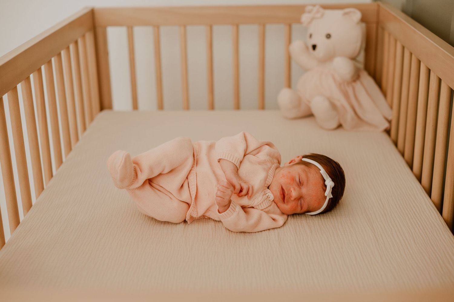 A cozy in-home newborn session in Denver, capturing the tender moments between parents and their precious little one. Soft, natural light fi