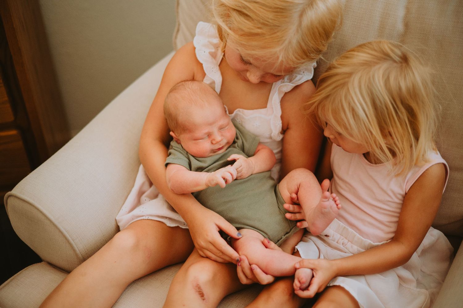 Sweet newborn snuggled in the warmth of home, capturing peaceful moments and the pure joy of new parenthood in a cozy, intimate setting