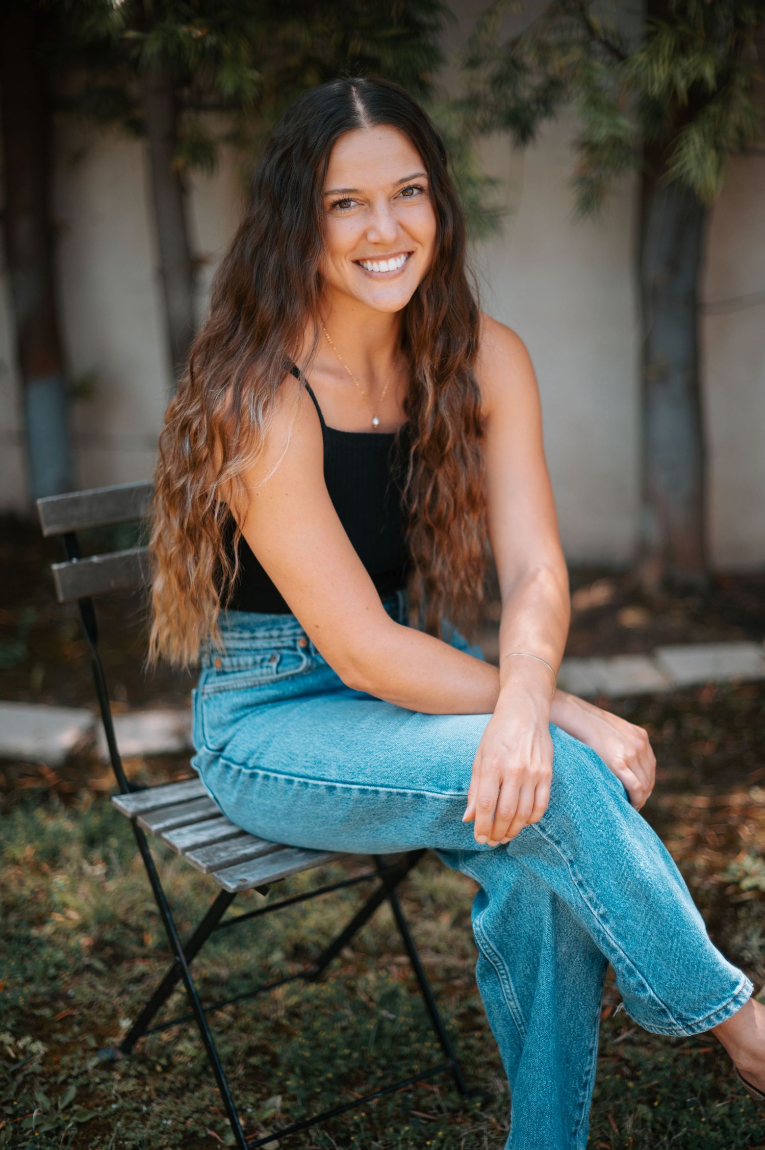 Effortlessly stylish, a branding shot of a girl in sunny California, capturing her unique personality and vibrant energy against a beautiful