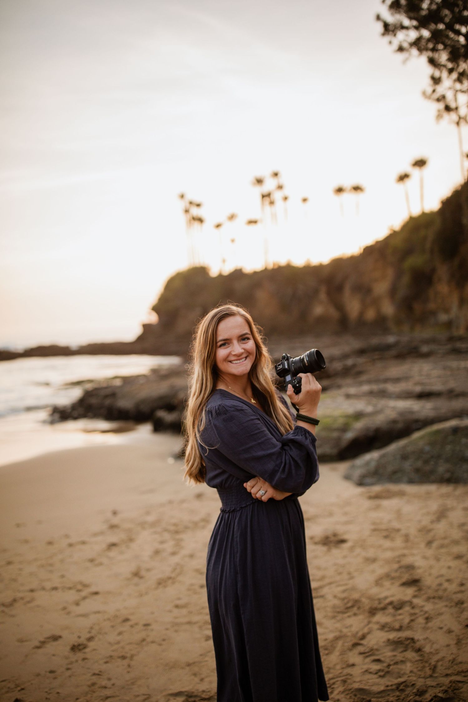 Maternity couple photo at sunset in Laguna Beach, expecting parents on the shore.
Beautiful maternity couple portrait at Laguna Beach with