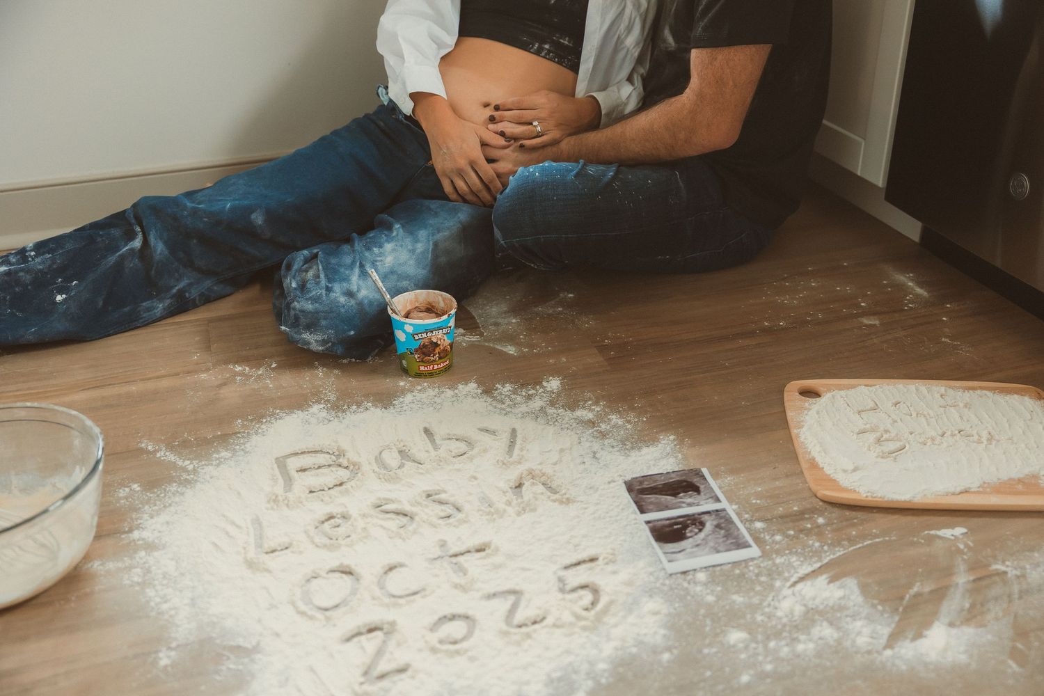 Writing in flour on kitchen floor spells out 
