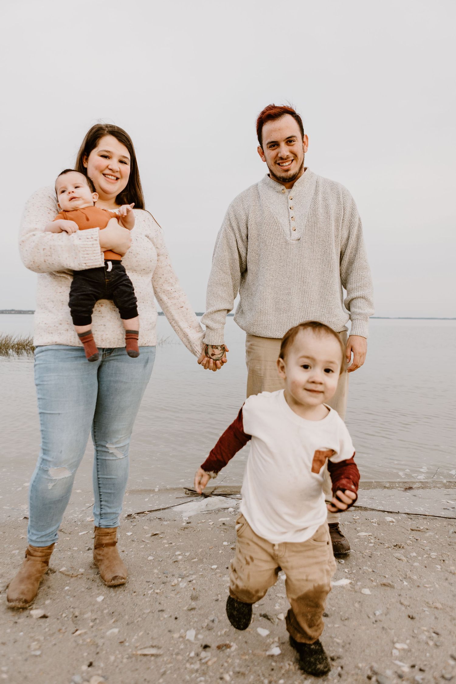family by the water