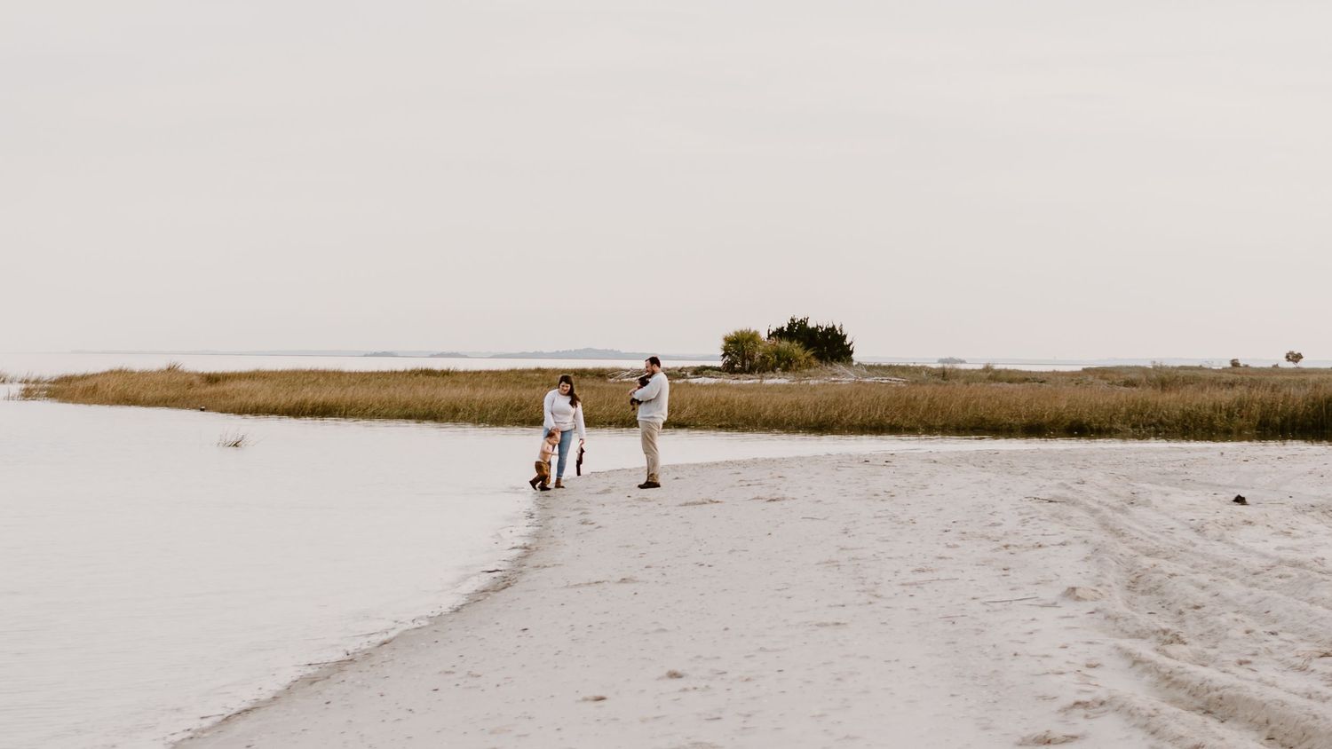 family by the water