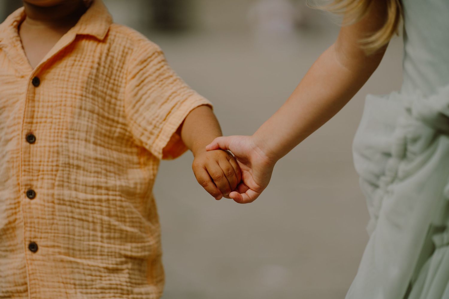 Kids holding hands during a photoshoot in Palermo