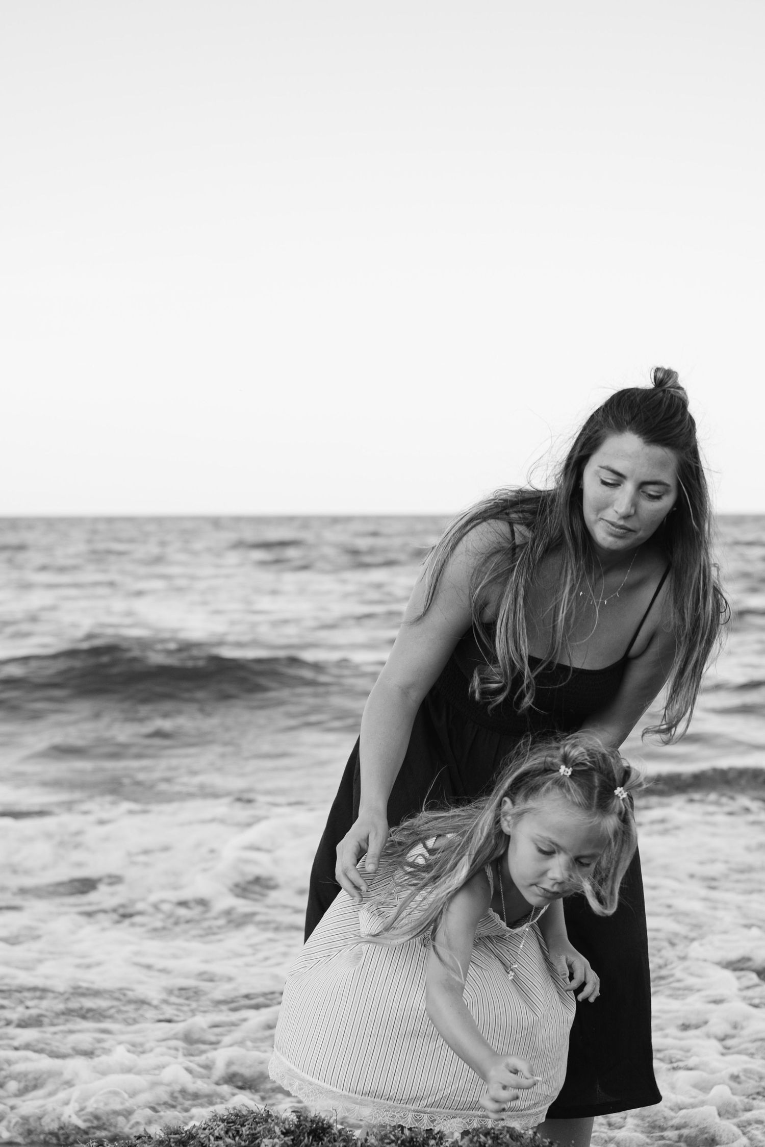 Motherhood photography, candid images shot by Lynae Moir Photography on Palm Beach Sunrise Beach, FL.