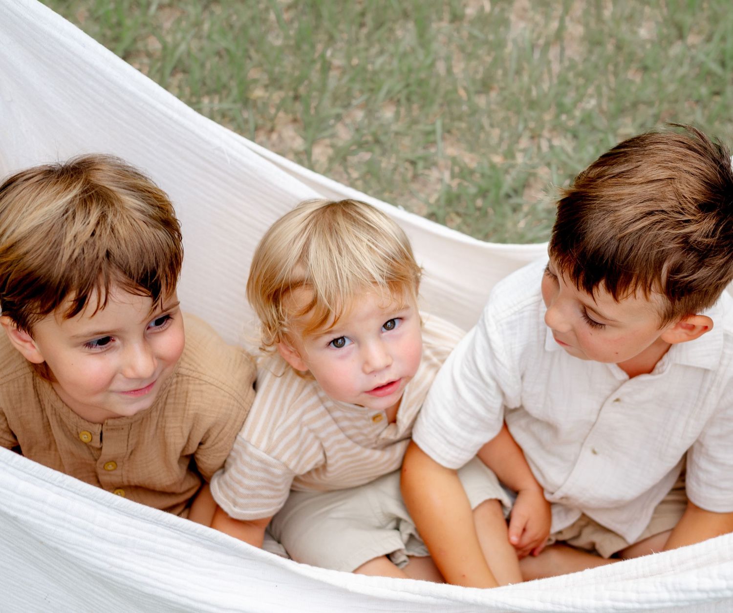 Lifestyle candid photography of three young boys in West Palm Beach Florida.