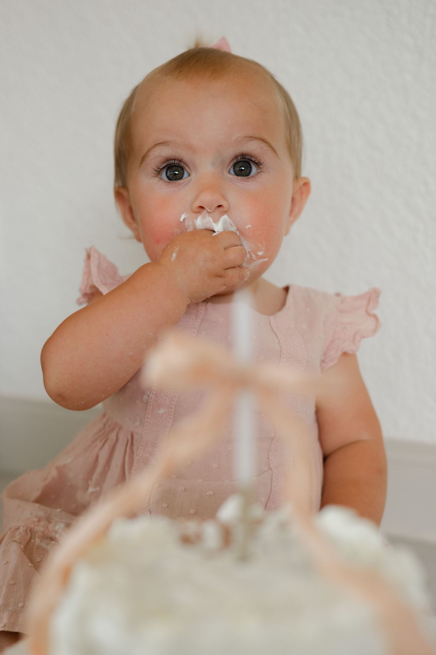 Babies first cake smash in Palm Beach Florida.