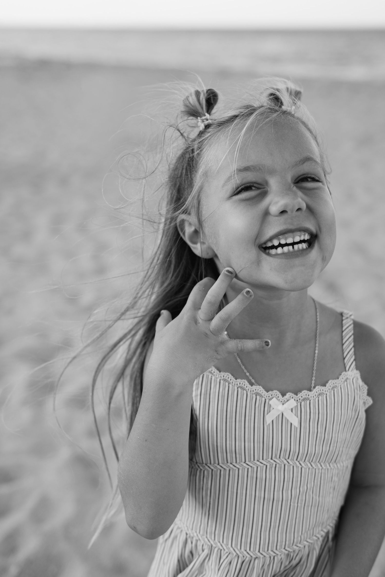 Candid photo of a young girl at the beach in Palm beach Florida
