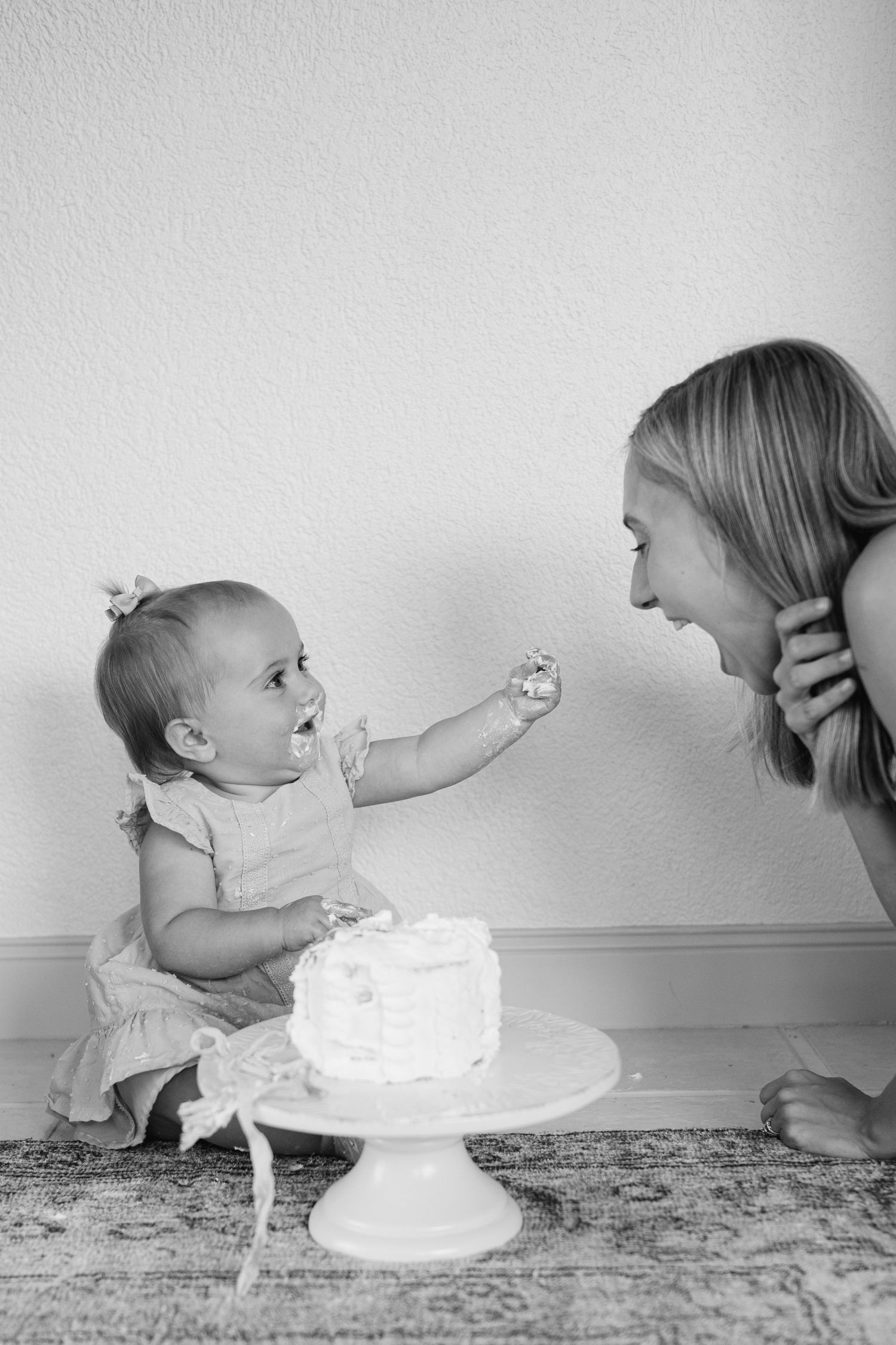 Mother and daughter during babies first birthday in West Palm Beach Florida.