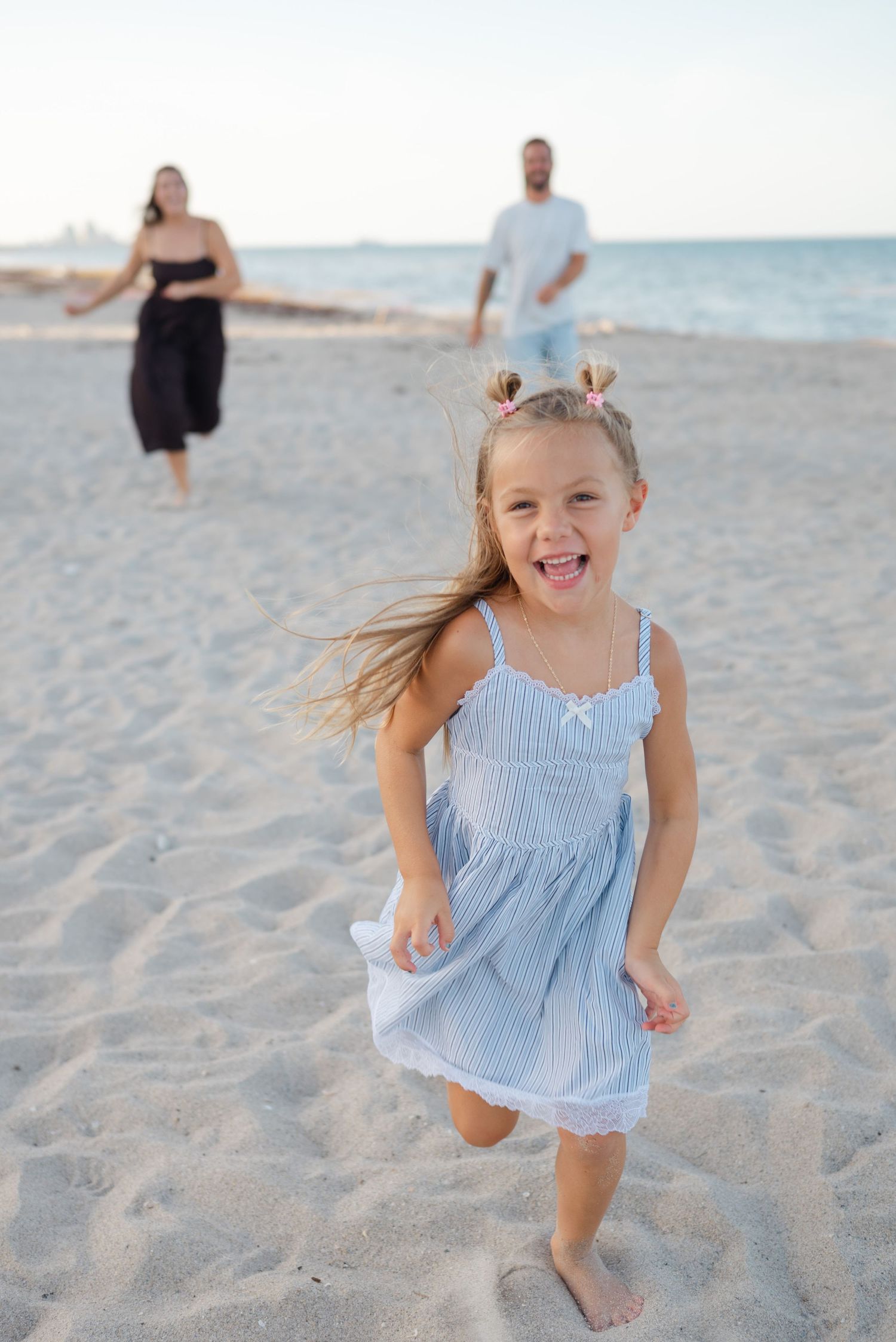 Candid family photo at Sunrise Beach Palm Beach Florida.