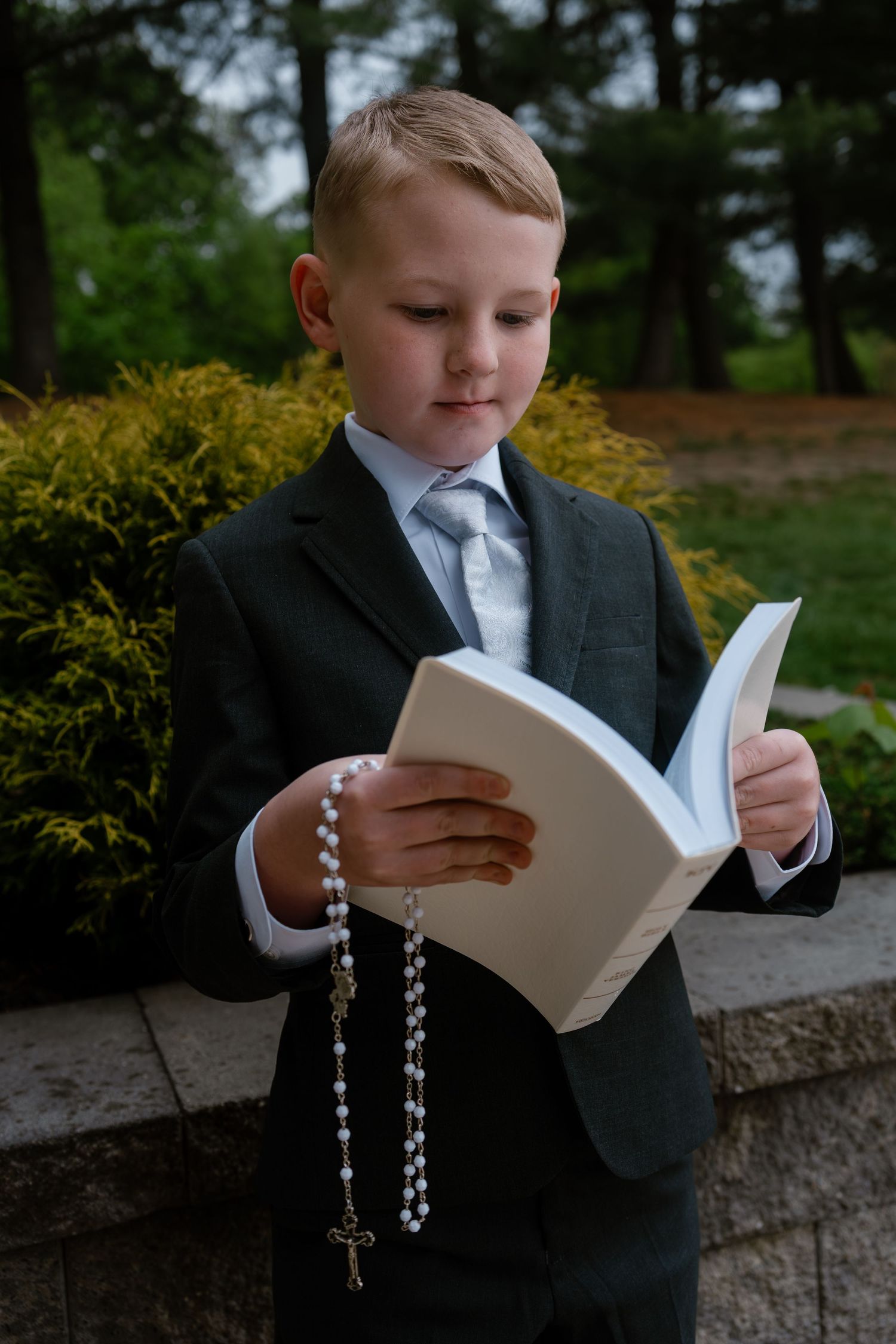 Child’s communion photos at Washington Lake Park in Sewell, New Jersey with natural outdoor portraits.