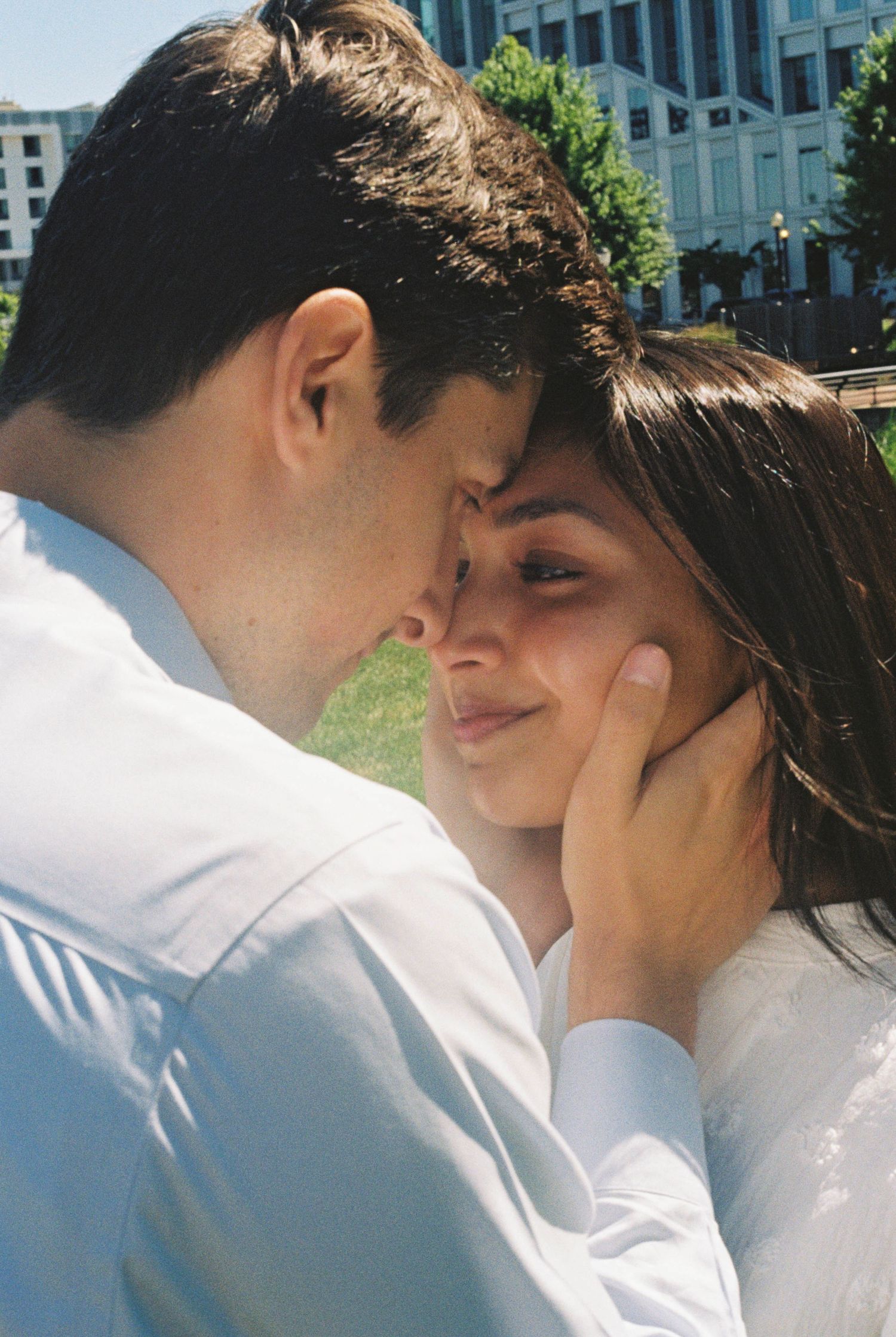 Film engagement session in Camden, New Jersey with romantic documentary-style photography by the Philadelphia waterfront.