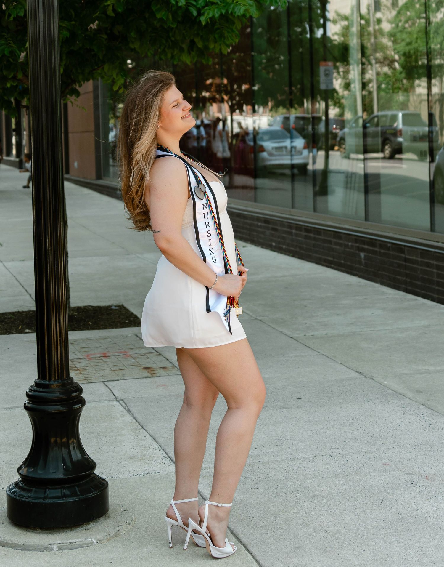 Nursing school graduation portraits at Rutgers University-Camden for a senior celebrating their degree.