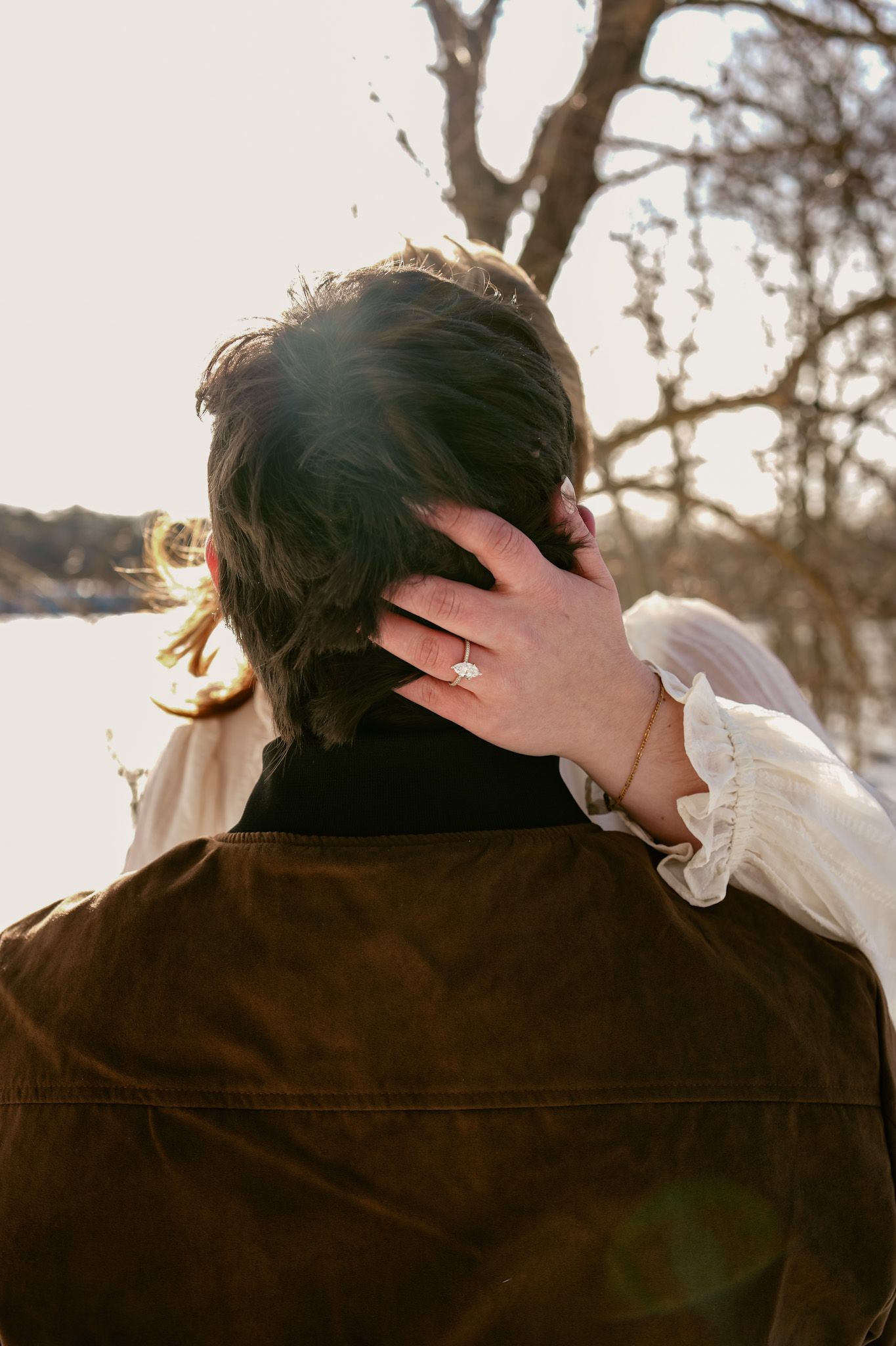 Winter engagement session at Historic Smithville Park in Burlington County with romantic couple portraits.