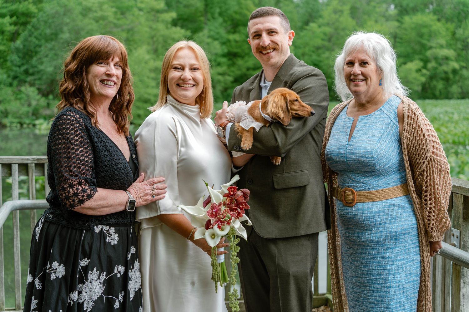 Historic Smithville vow renewal portrait with the couple, their dog, and mothers in Burlington County.