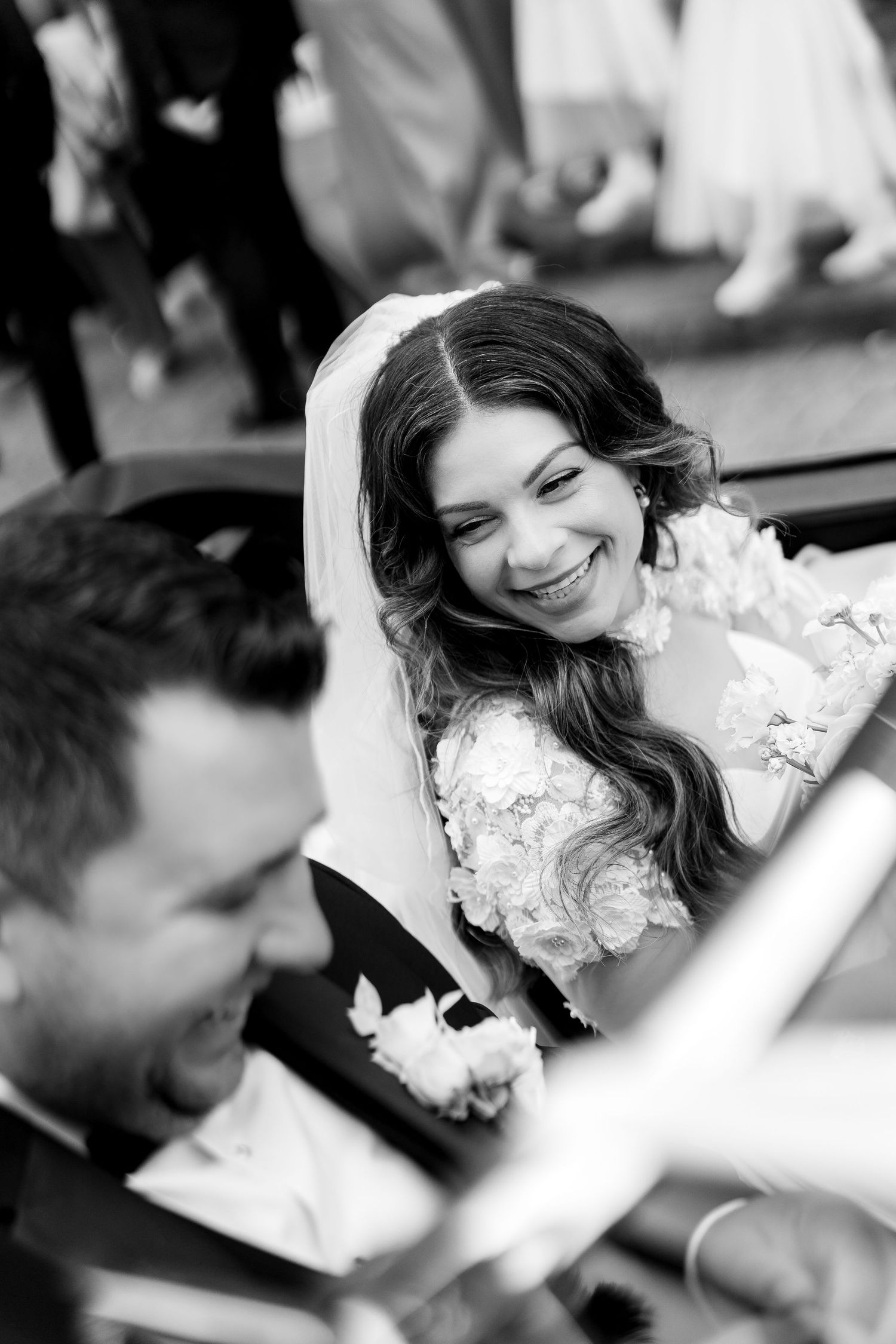 A sequence of black and white candid photos capturing moments of joy, laughter and fun.