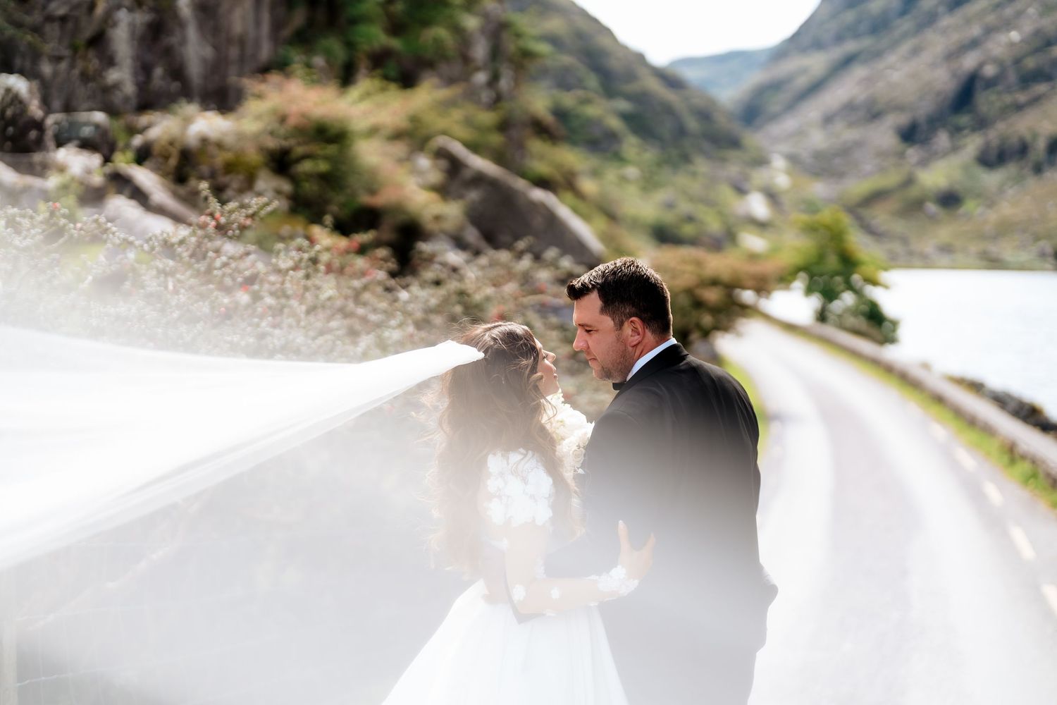 A scenic collection of photos showing snow-capped mountains, rugged landscapes, and winding mountain roads in New Zealand.