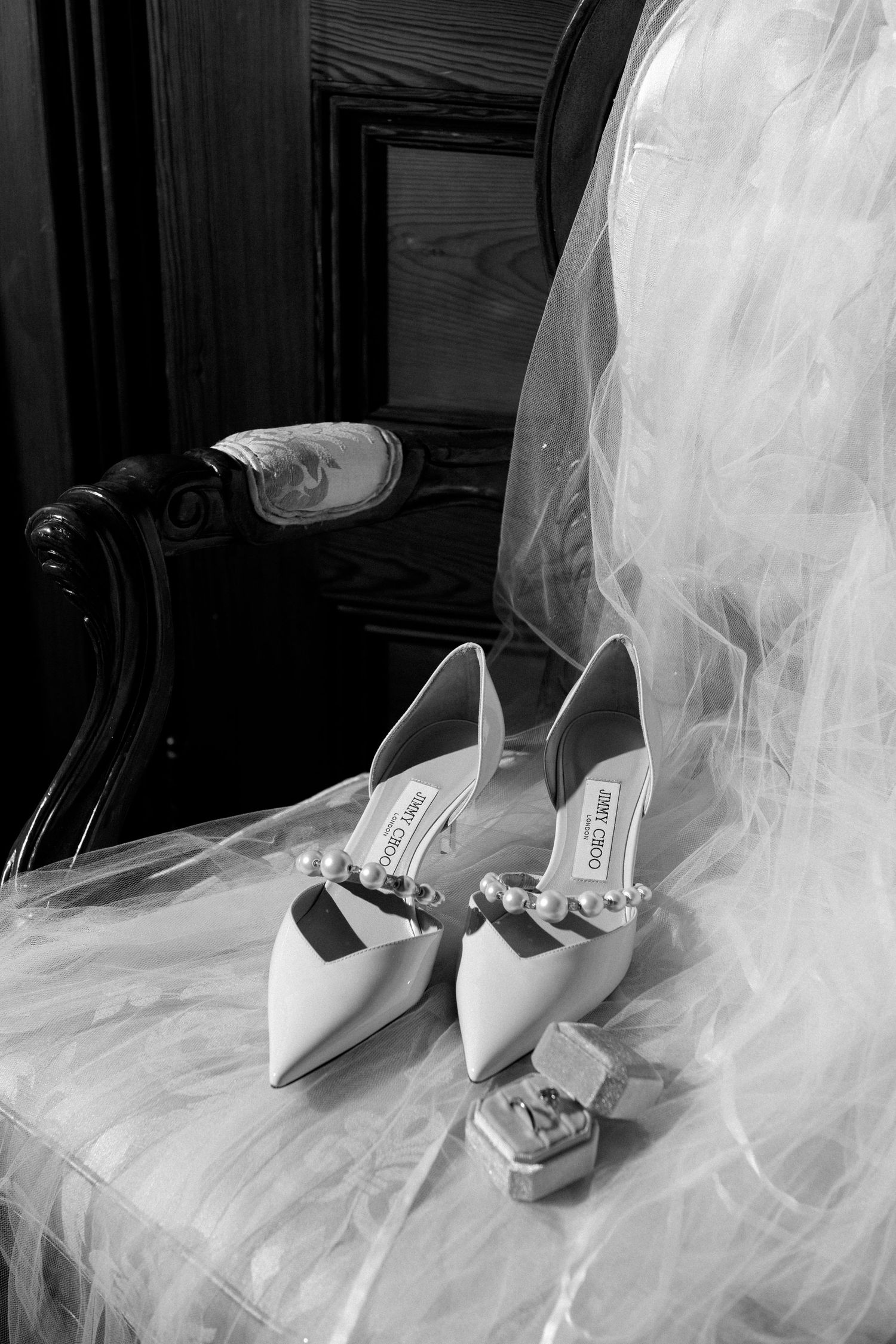 Artful B&W wedding portrait by Veronique Jones. A refined, timeless narrative capturing raw emotion and sophisticated editorial style.