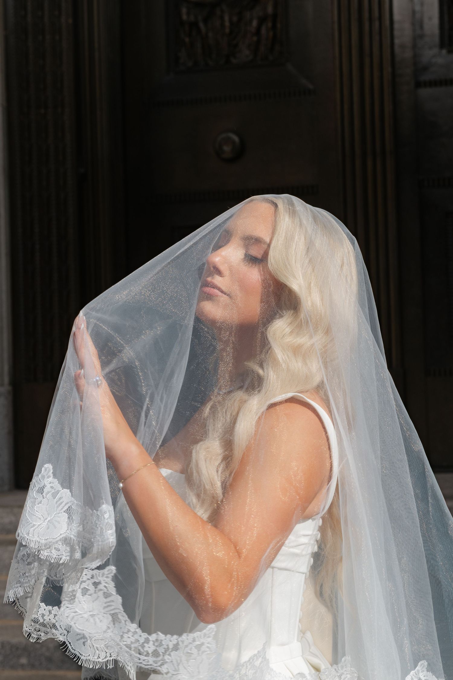 Artful, moody wedding portrait by Veronique Jones. A refined, timeless narrative capturing raw emotion and sophisticated editorial style.