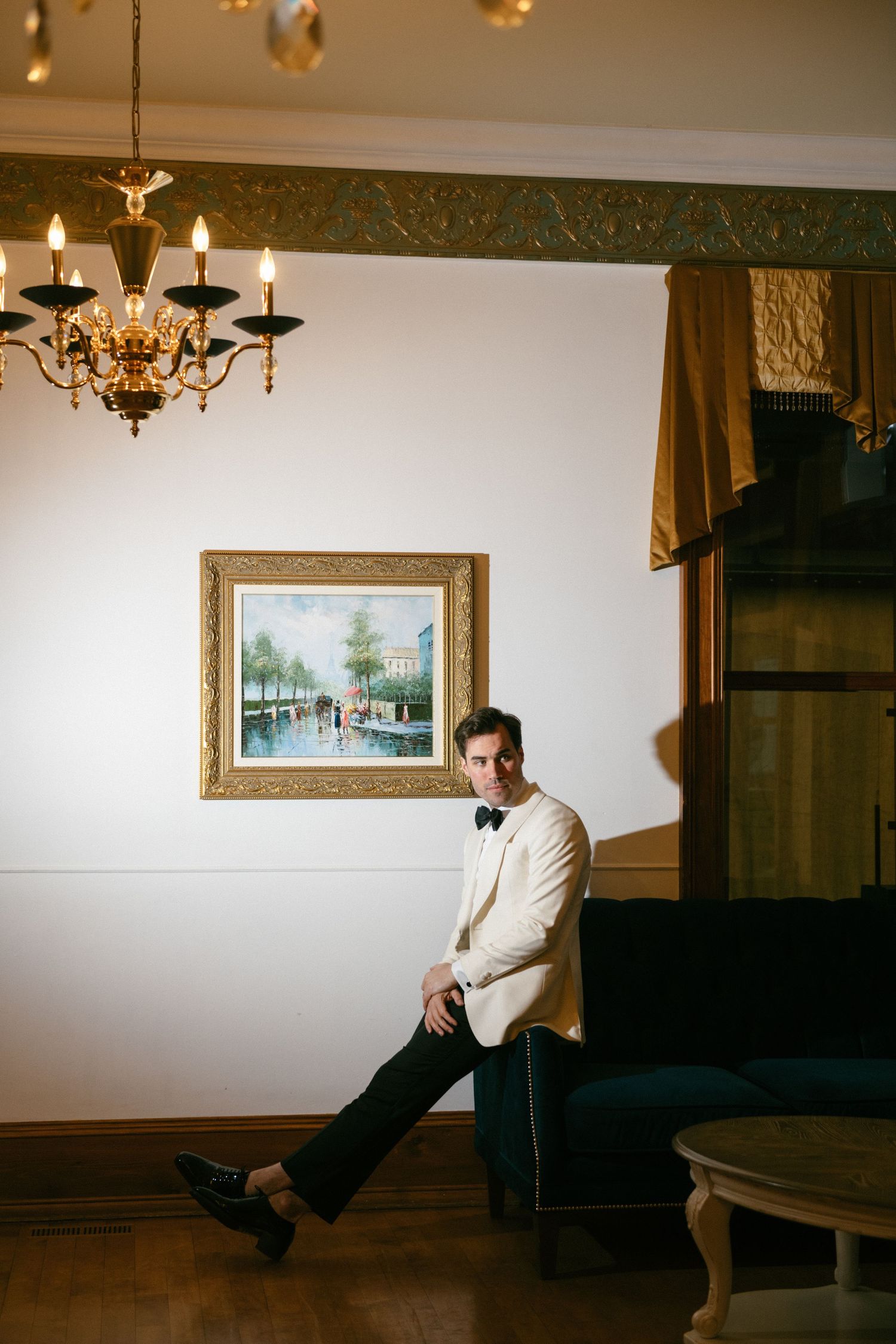 Modern groom portrait at Château Saint-Antoine by Veronique Jones. Refined editorial style for the sophisticated, timeless groom.
