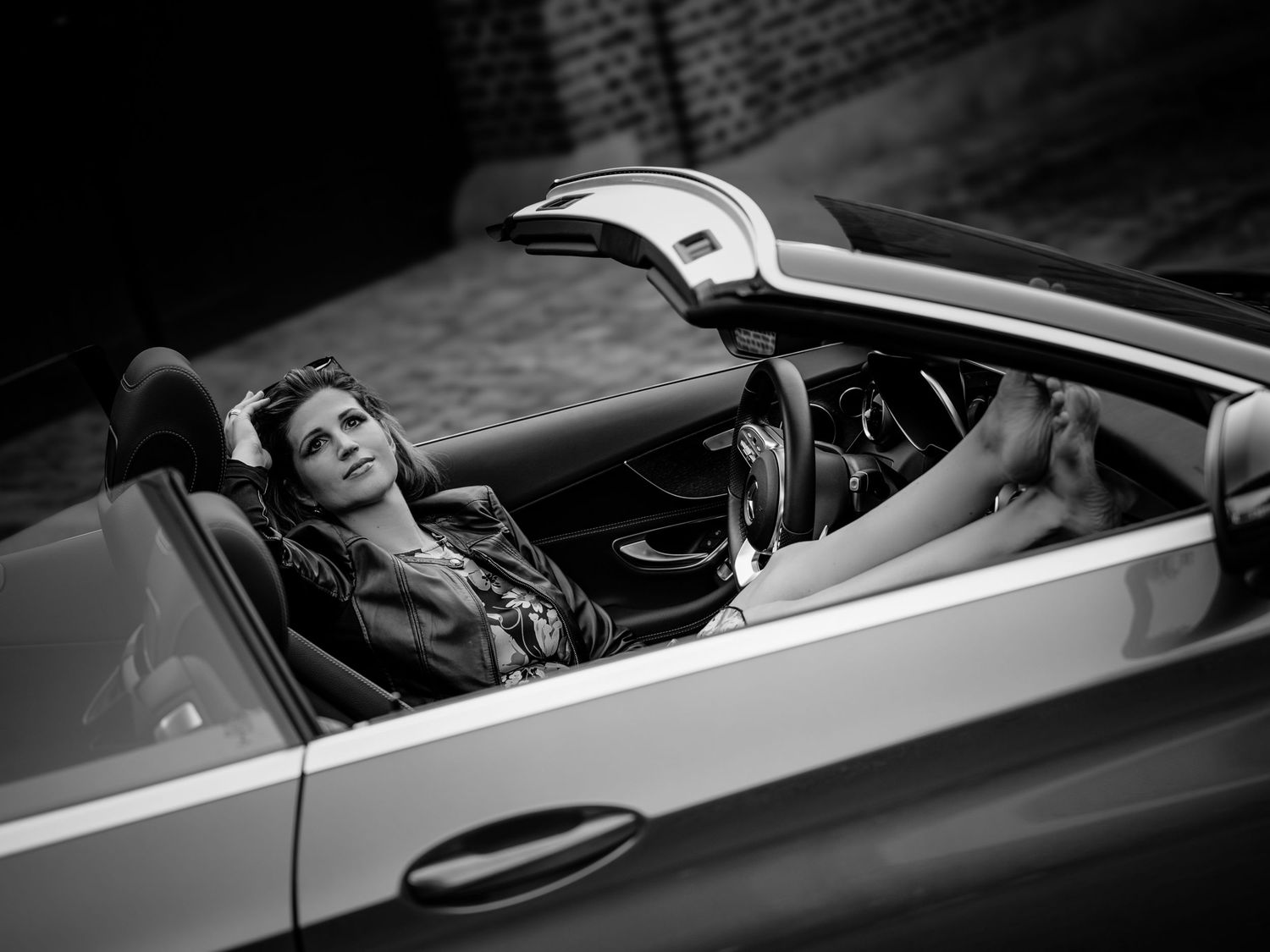 Personality Portrait einer Frau im Auto, fotografiert von Fotografin Christina Förster, Fotograf Bochum, NRW
