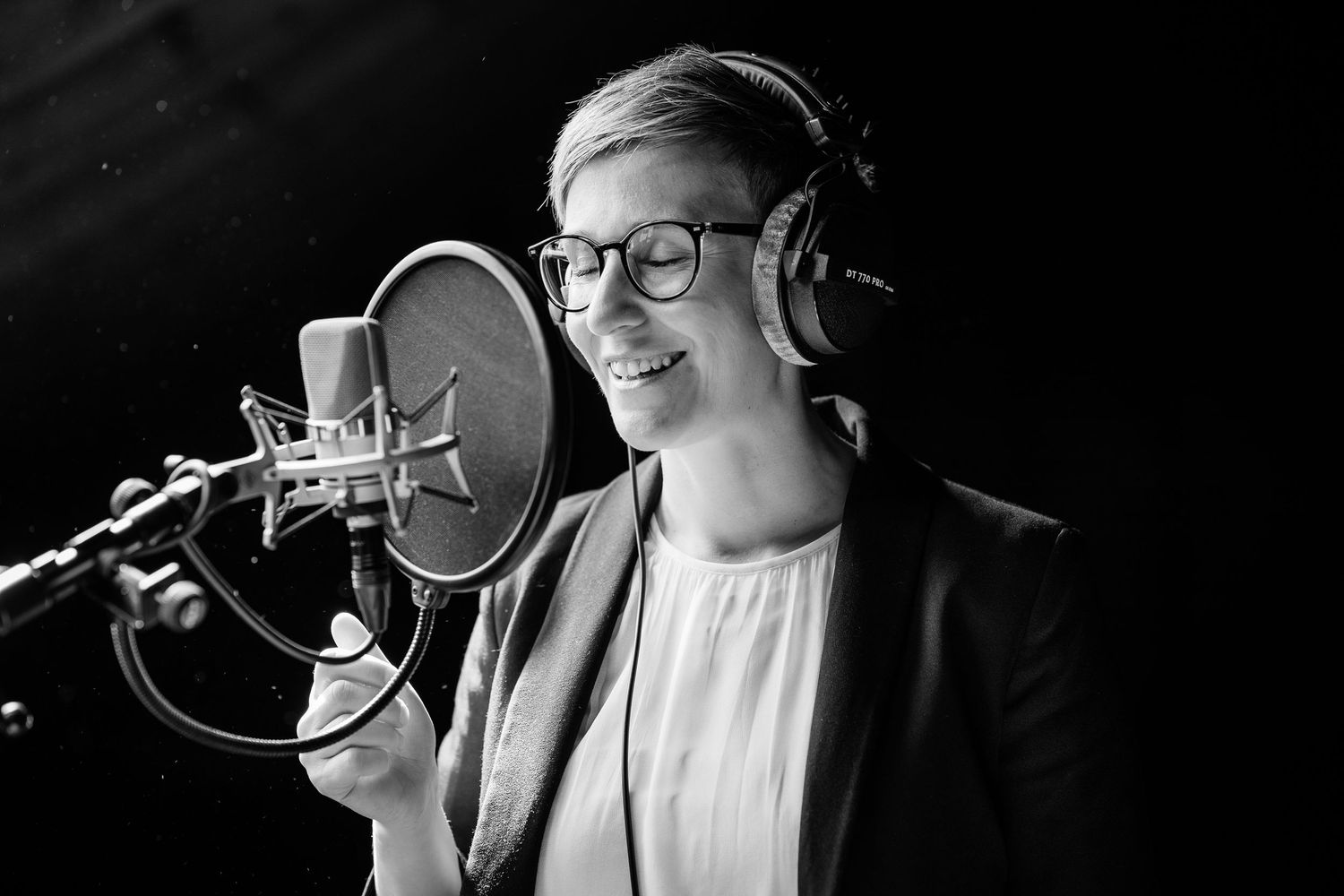 Businessportrait einer Frau beim Sprechen, fotografiert von Fotografin Christina Förster, Fotograf Bochum