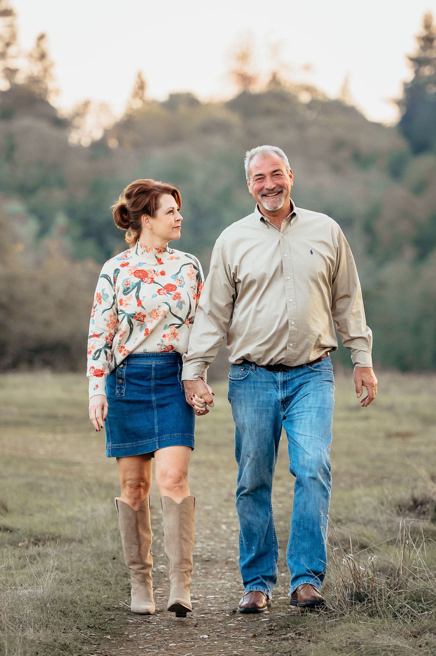 Laughing Couple walking along a dirt path at Norma Hamlin Park in Orangevale, California