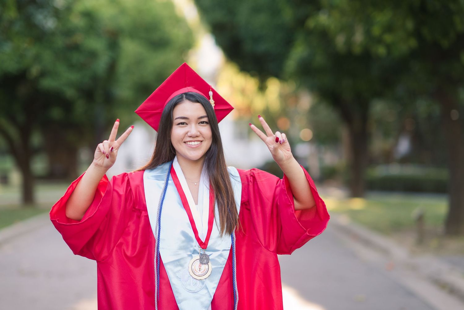 Senior Girl at the Sacramento State Capitol in her cap and gown
