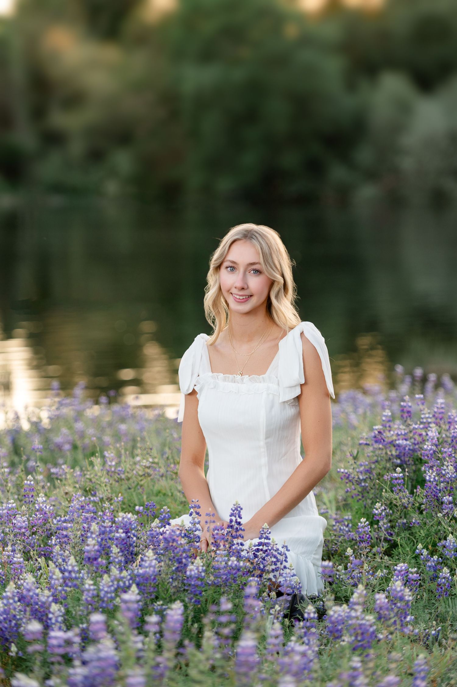 Senior portrait taken in spring with Lupine in Fair Oaks, CA