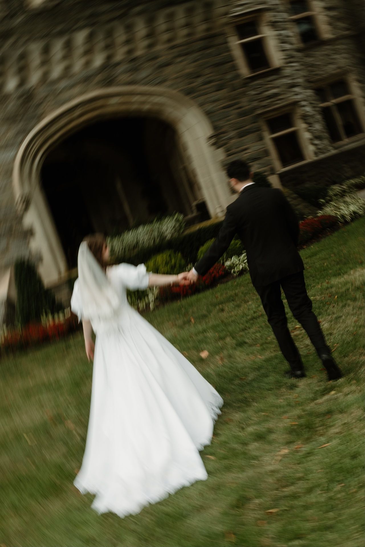 Minneapolis wedding photographer photographing couple walking together