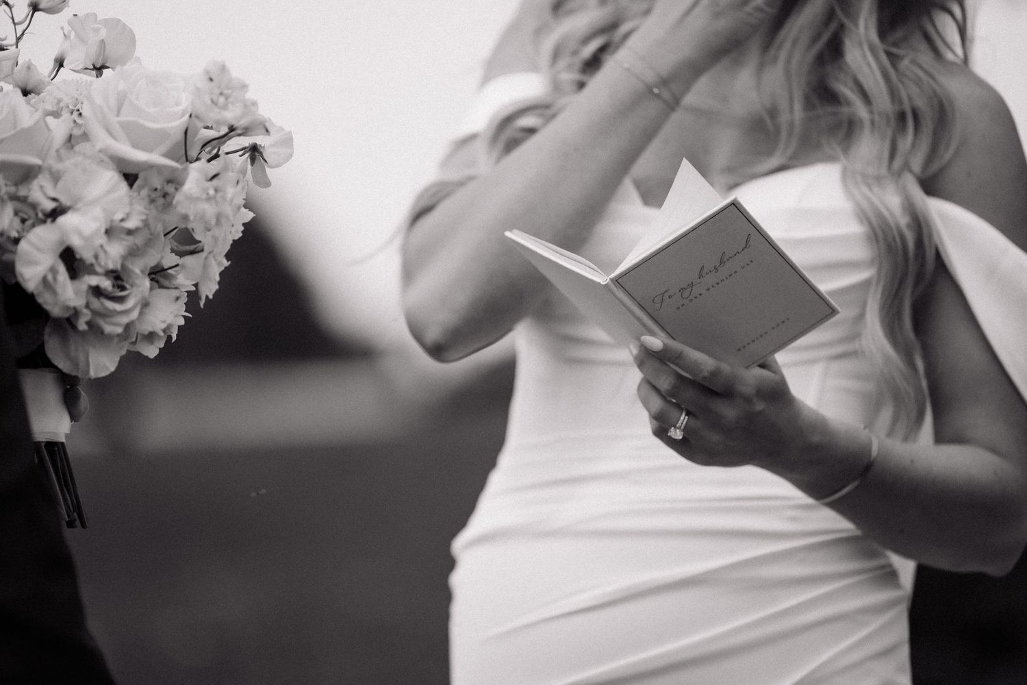 A black and white collage of wedding preparation moments showing details of a dress and bouquet.
