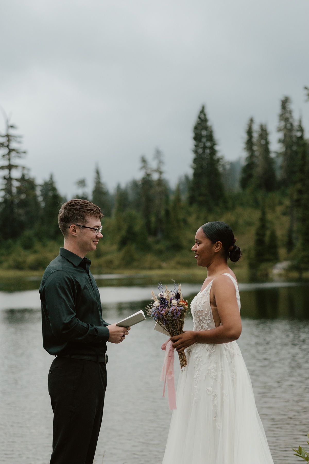 Adventure elopement photographer capturing a relaxed elopement session in a natural setting