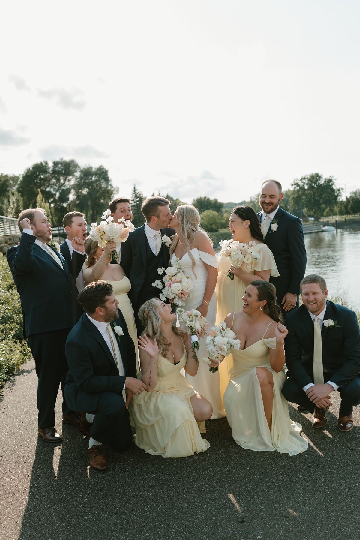 Minneapolis wedding photography photos of a wedding party by the river