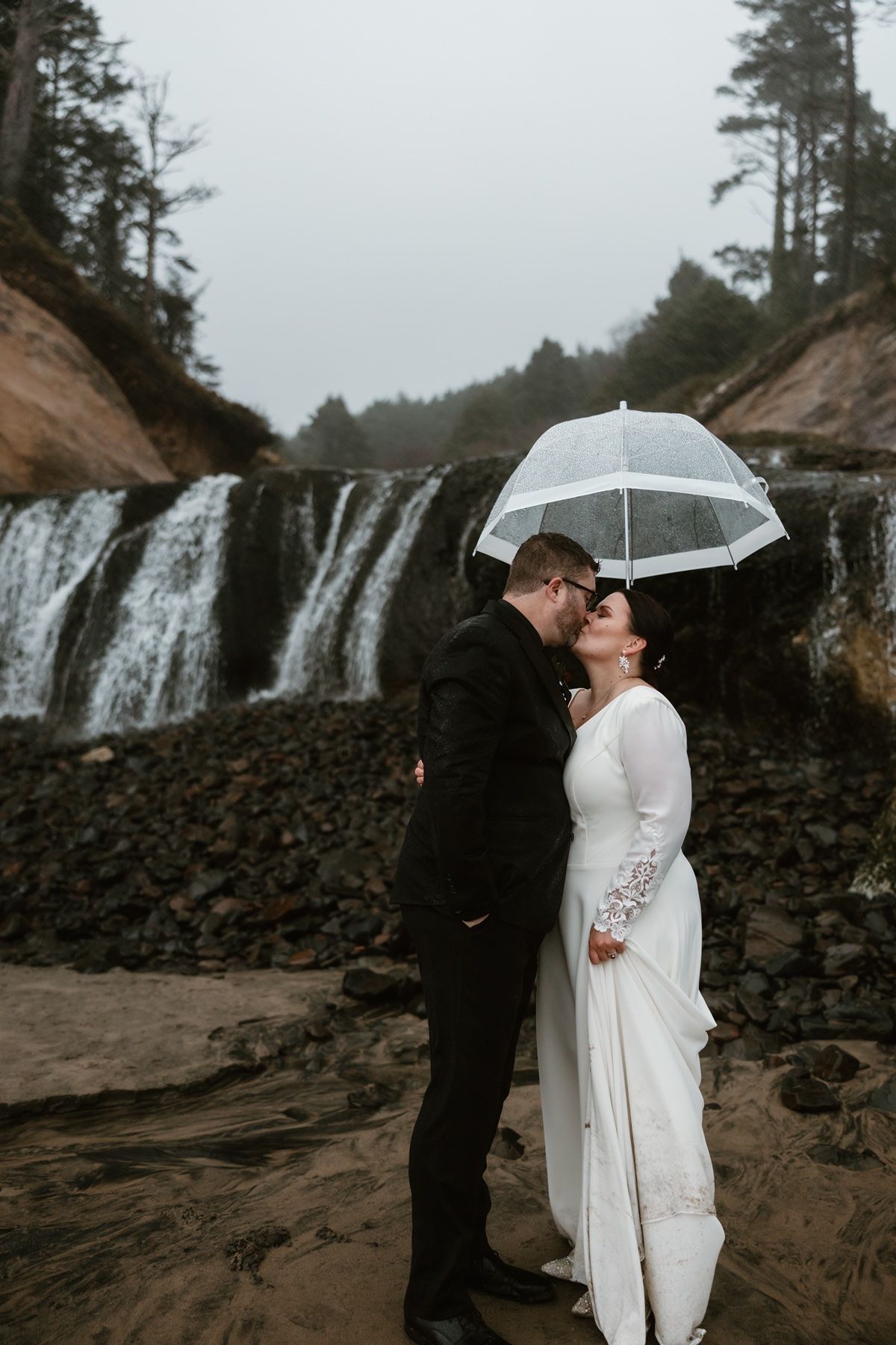 Rainy adventure elopement photography session at Hug Point on the Oregon Coast