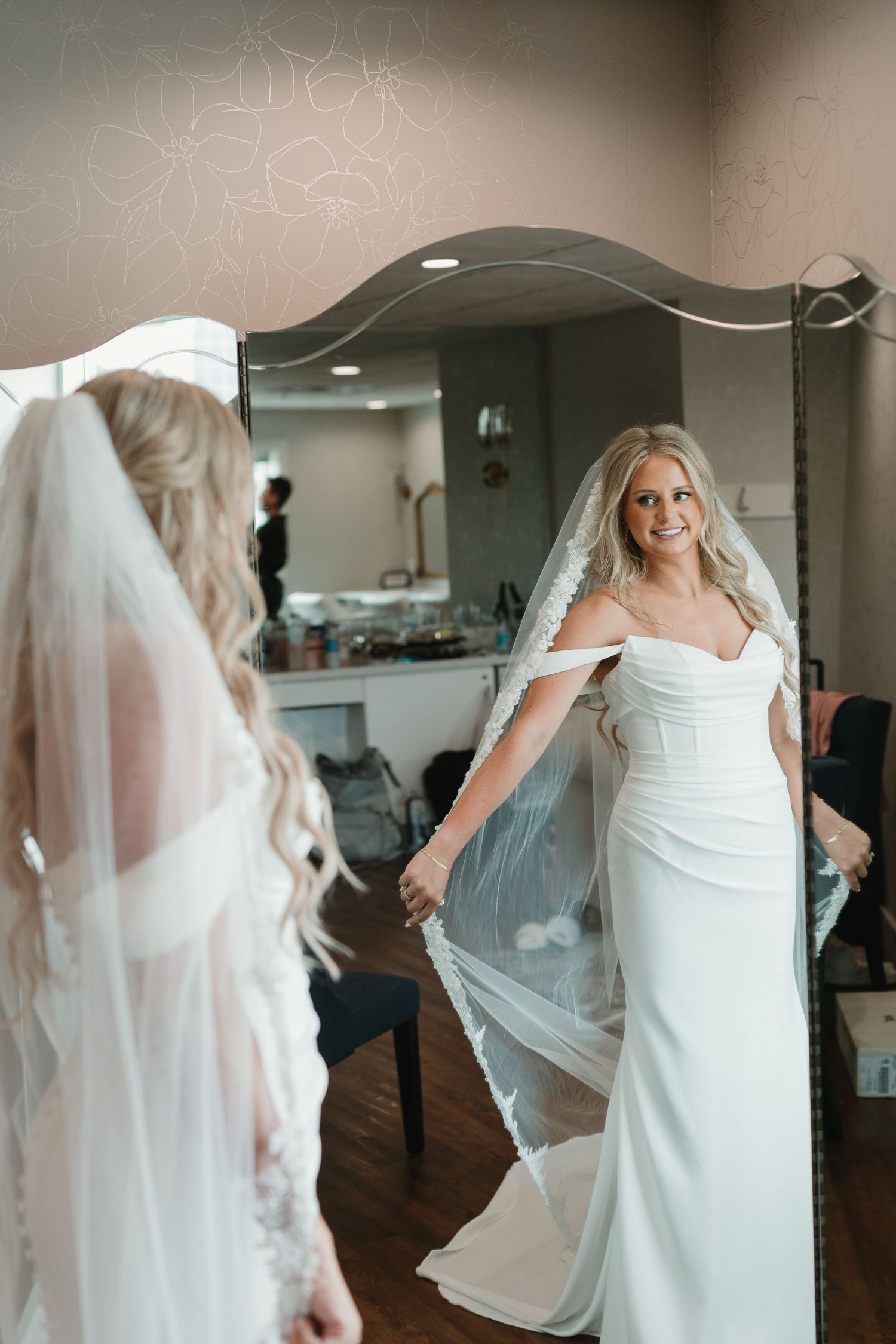 A series of photos showing someone in a white wedding dress twirling and dancing in an indoor venue.