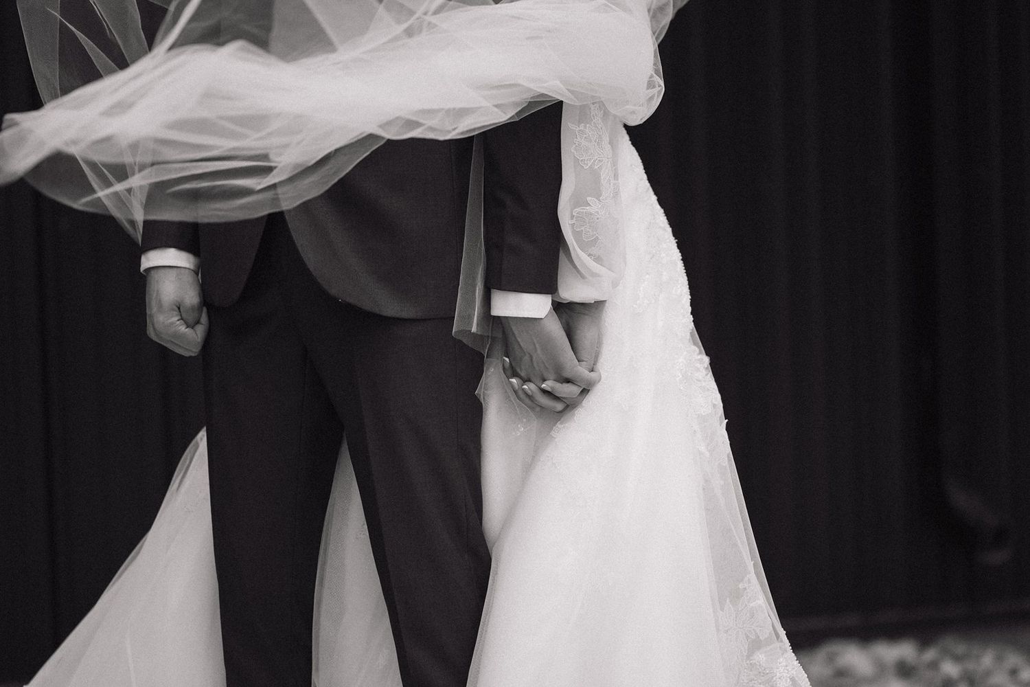 A series of black and white wedding photos showing couples dancing and embracing at a reception celebration.