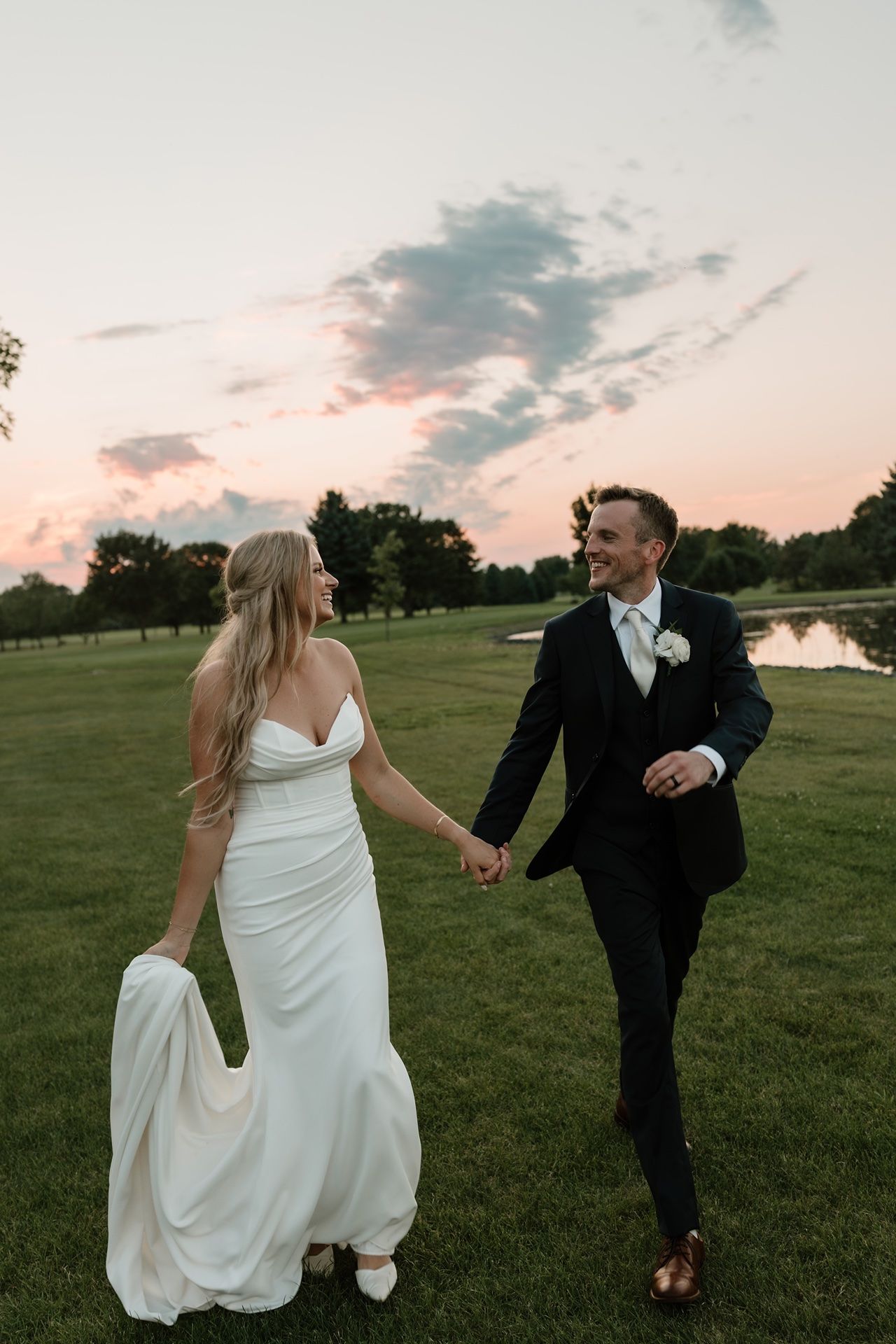 wedding photographer in Minneapolis capturing a couple walking together outdoors