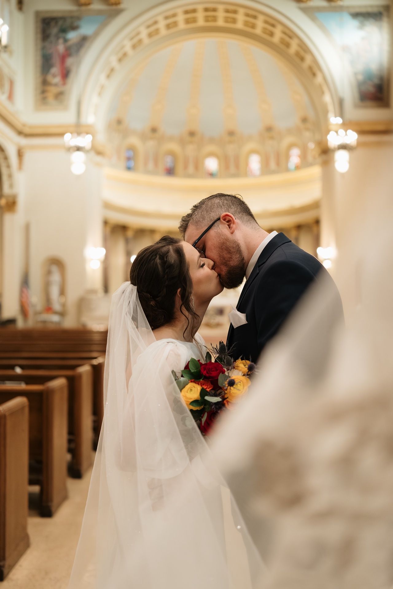 Catholic wedding portraits in the stunning Holy Cross Catholic Church