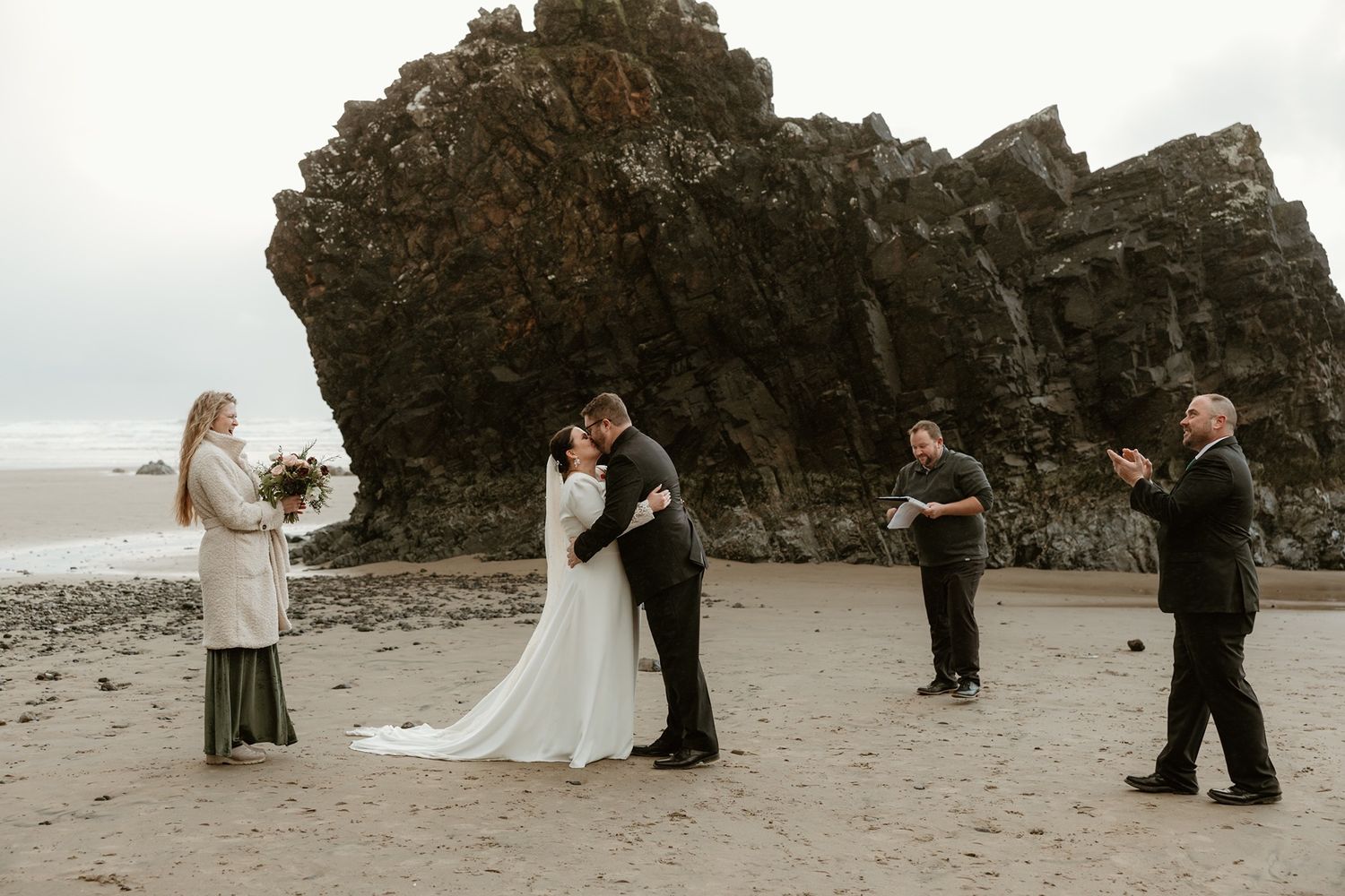 Adventure elopement photographer capturing an intimate beach elopement in Oregon