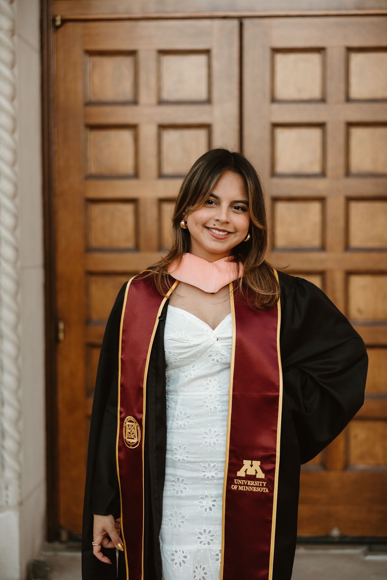 Minneapolis graduation photographer documenting college graduate session at the U of M