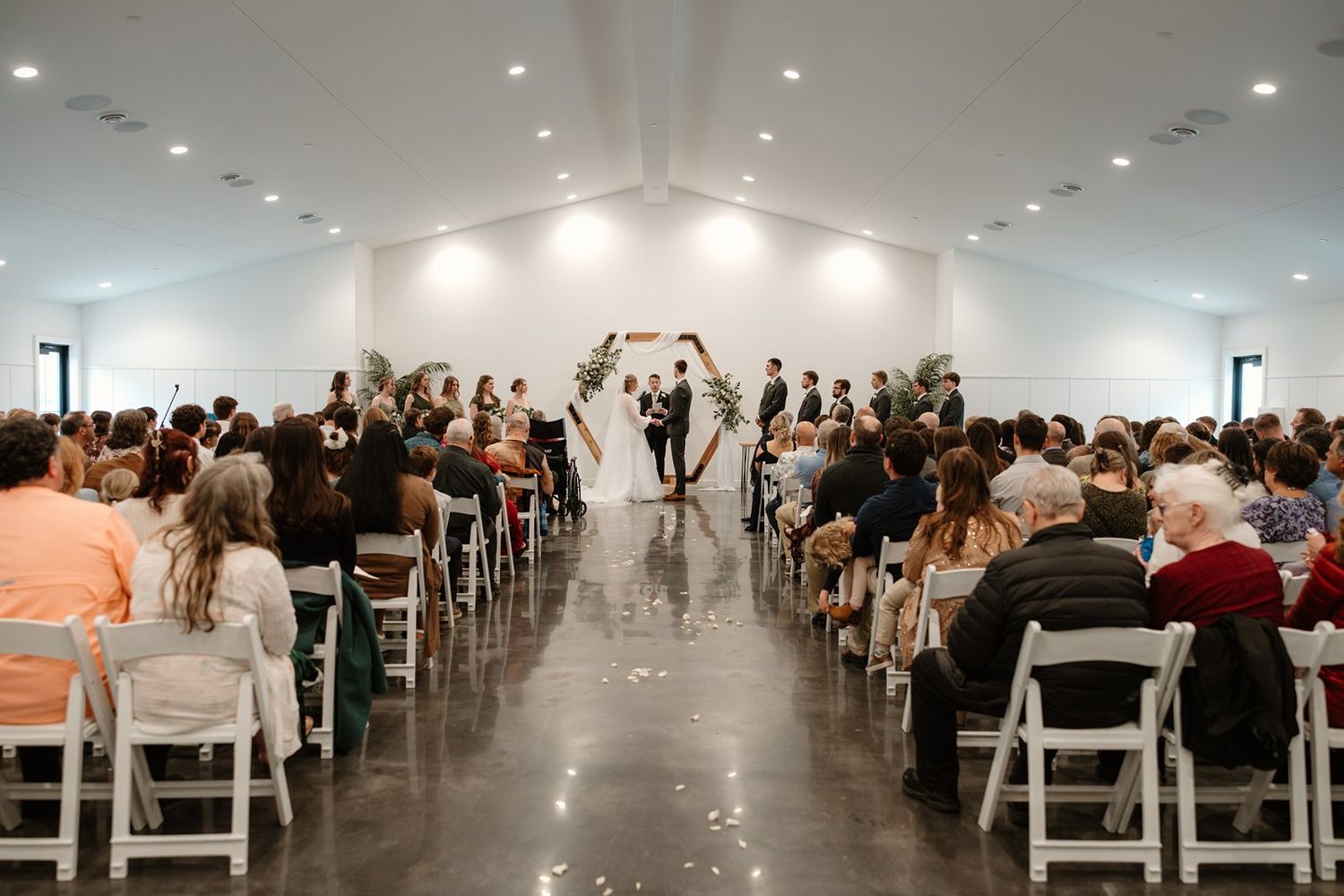 Indoor wedding ceremony at The Pines Black in Davenport, ND