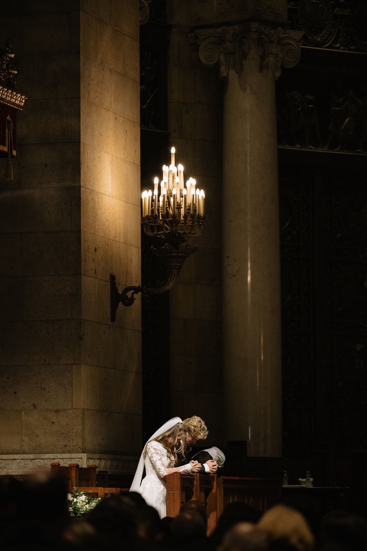 Catholic wedding photographer capturing moments inside a wedding at St. Paul Cathedral in St. Paul, MN