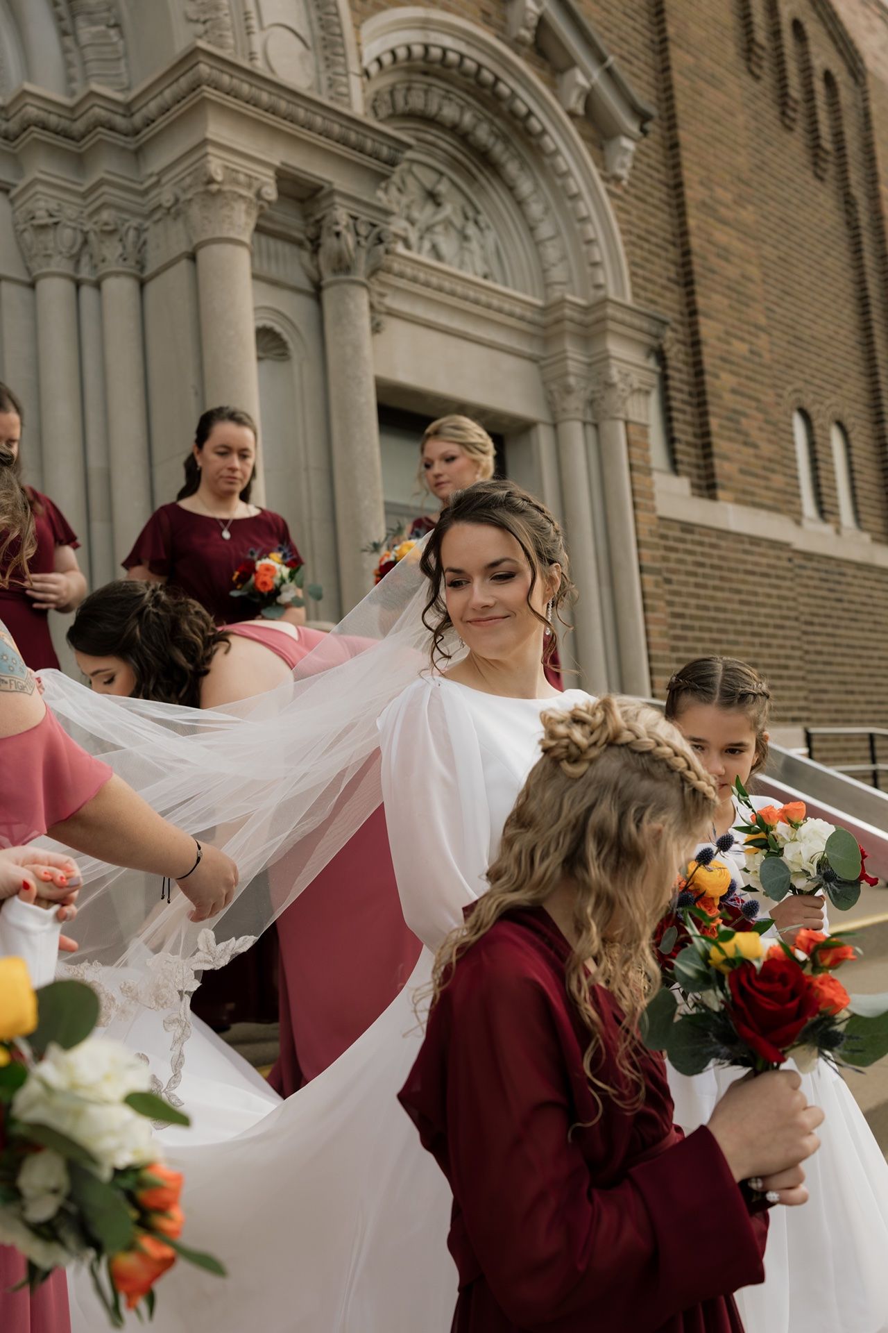 timeless Catholic wedding portraits photographed on the church steps