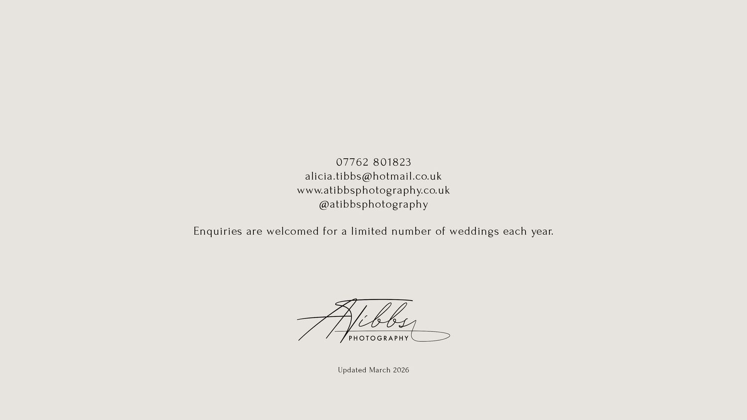 Simple black text on white paper shows a handwritten signature with elegant calligraphy.