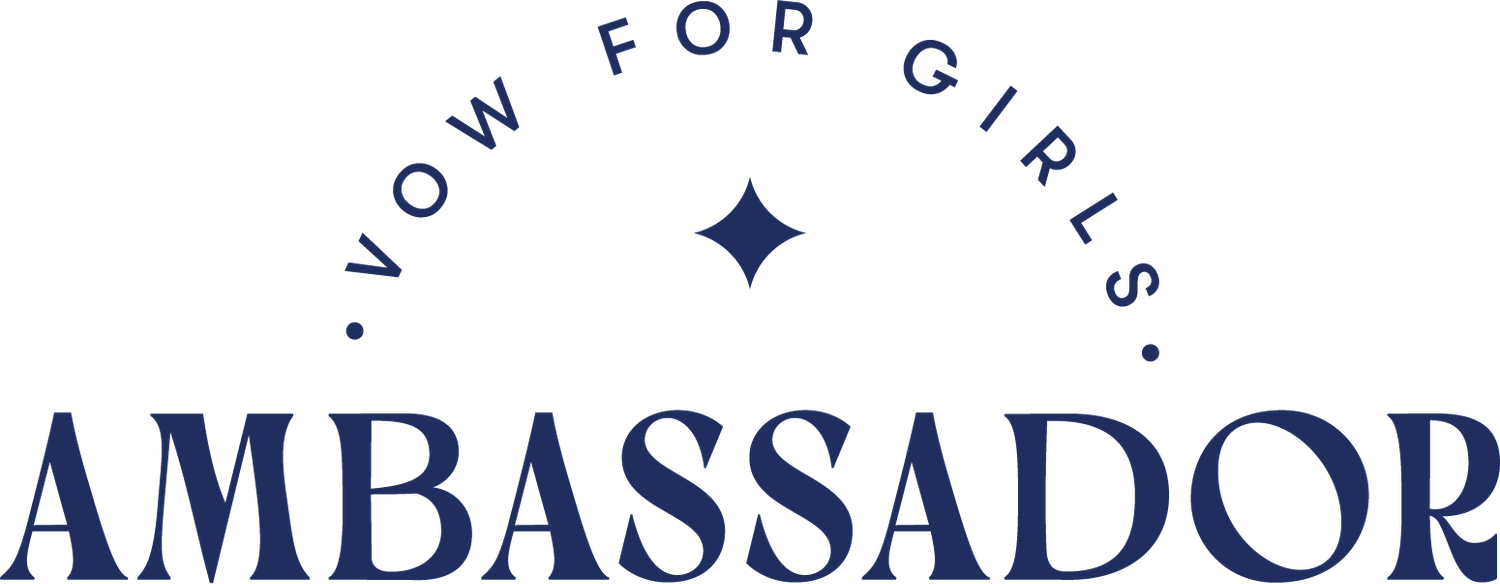 A navy blue and white logo design featuring text and a star emblem for an ambassador program.