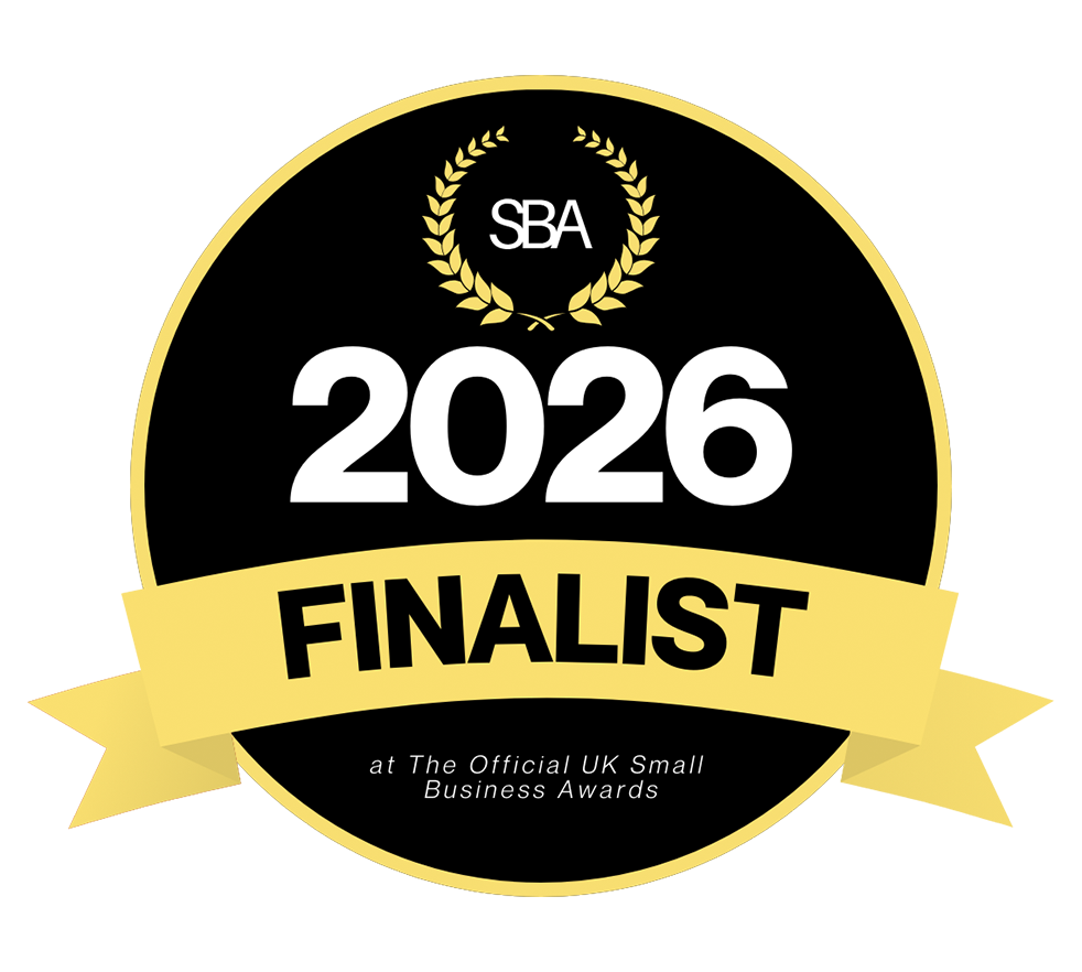 Black circular badge with gold laurel wreath reading 2026 Finalist at The Official UK Small Business Awards SBA.