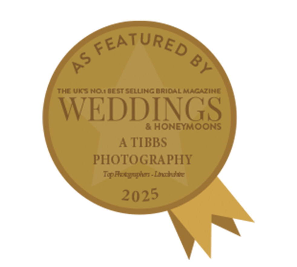 Gold award badge for featured wedding photography and honeymoons magazine recognition.